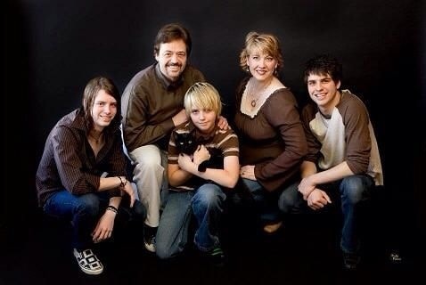 A picture of Jay Osmond with his wife and kids.
